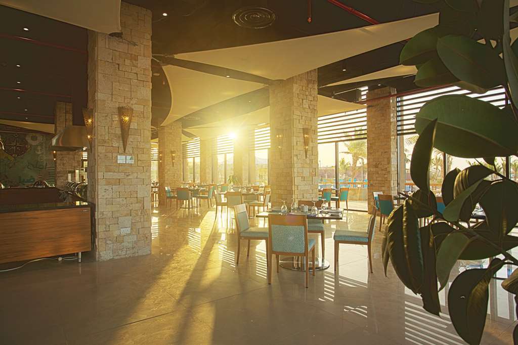 Golden Tulip Sharma Resort Restaurant foto