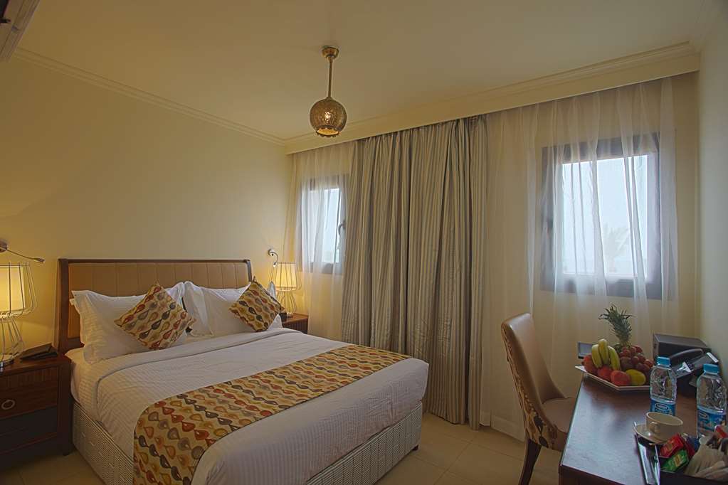 Golden Tulip Sharma Resort Zimmer foto